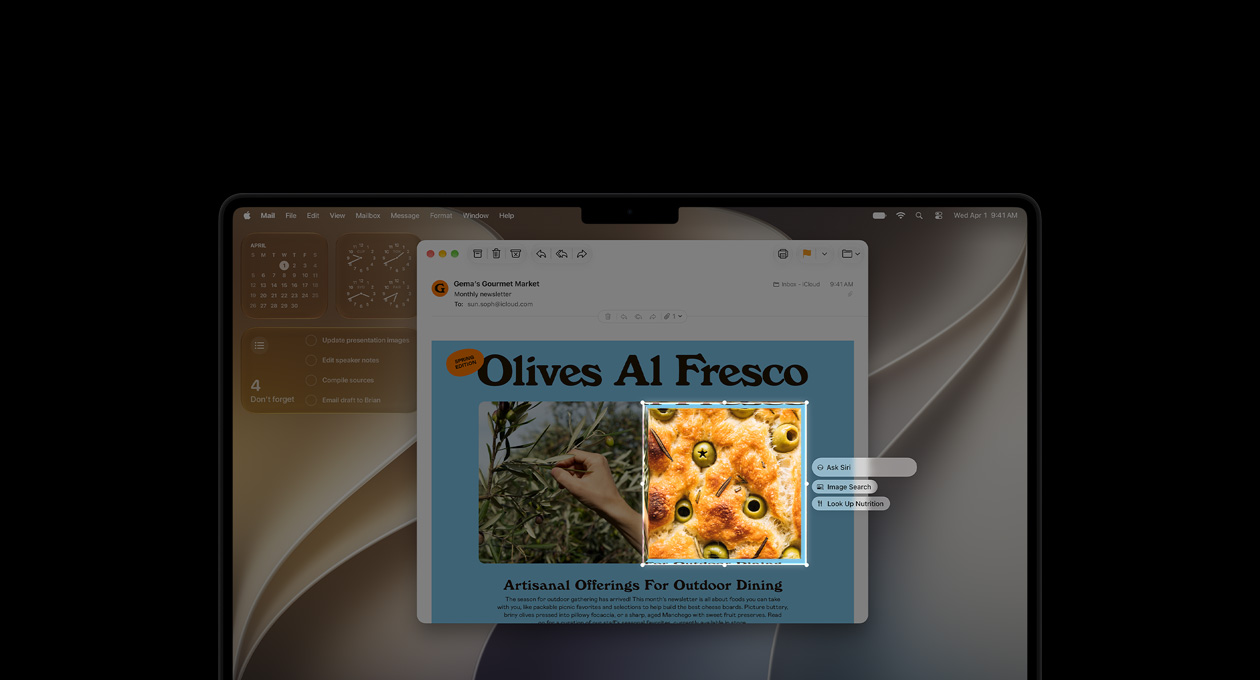 14palcový MacBook Pro, vesmírně černý, na obrazovce je ukázka vizuální inteligence na e‑mailu s obrázky jídla a bylinek, obrázek pečiva s olivami ohraničený rámečkem, u kterého se zobrazují tři prompty, včetně výzvy ke zjištění dalších informací, vyhledání obrázků a dohledání nutričních údajů