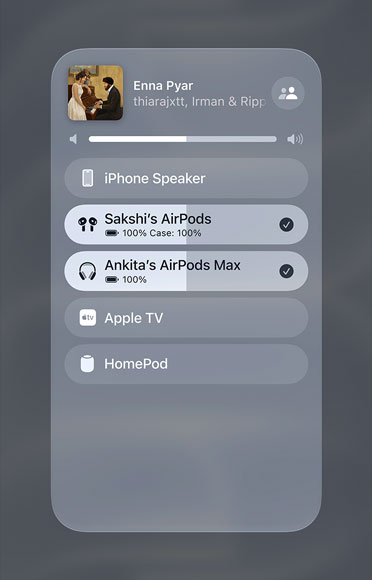 Image of a song on Apple Music playing on two different sets of AirPods.