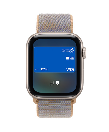 Apple Watch SE 3, aluminum case, starlight color, screen shows Wallet, payment card graphic, right side exterior, Digital Crown dial, Sport Loop band, chambray blue color (light blue-gray)
